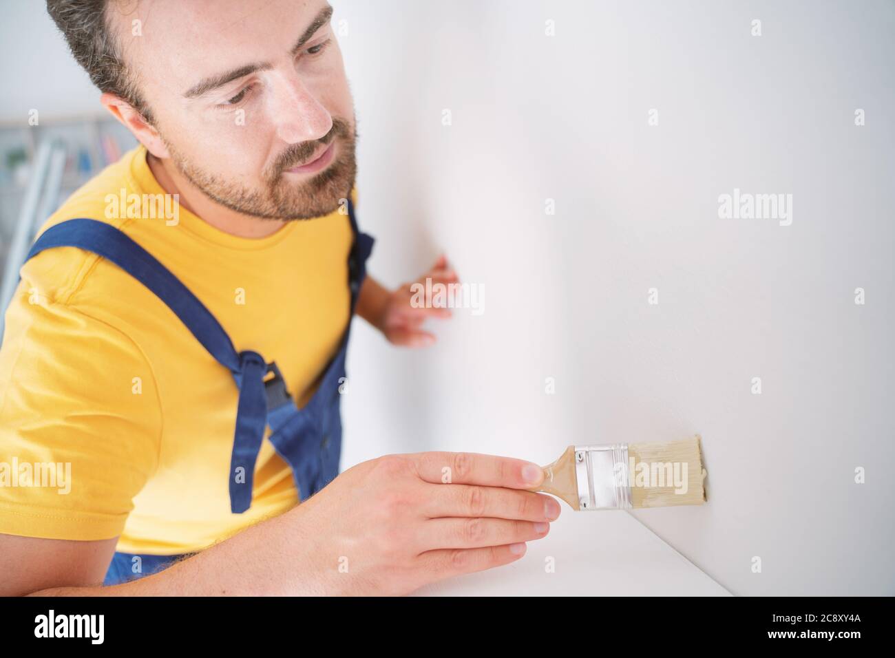 Painter working at home with painting tools Stock Photo