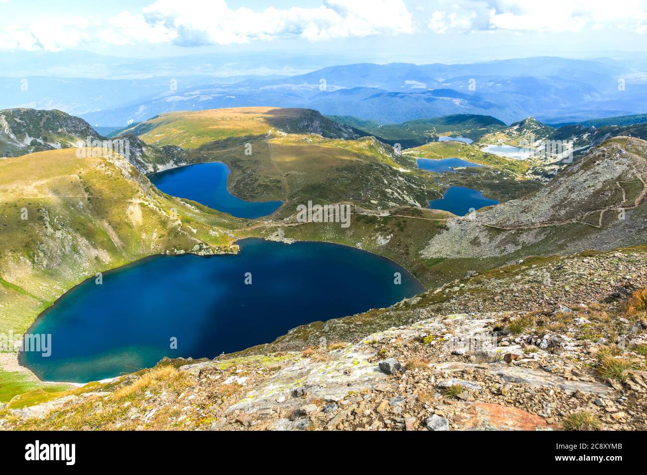 Panoramic View Of The Seven Rila Lakes Rila Mountain Bulgaria Stock panoramic-view-of-the-seven-rila-lakes-rila-mountain-bulgaria-stock