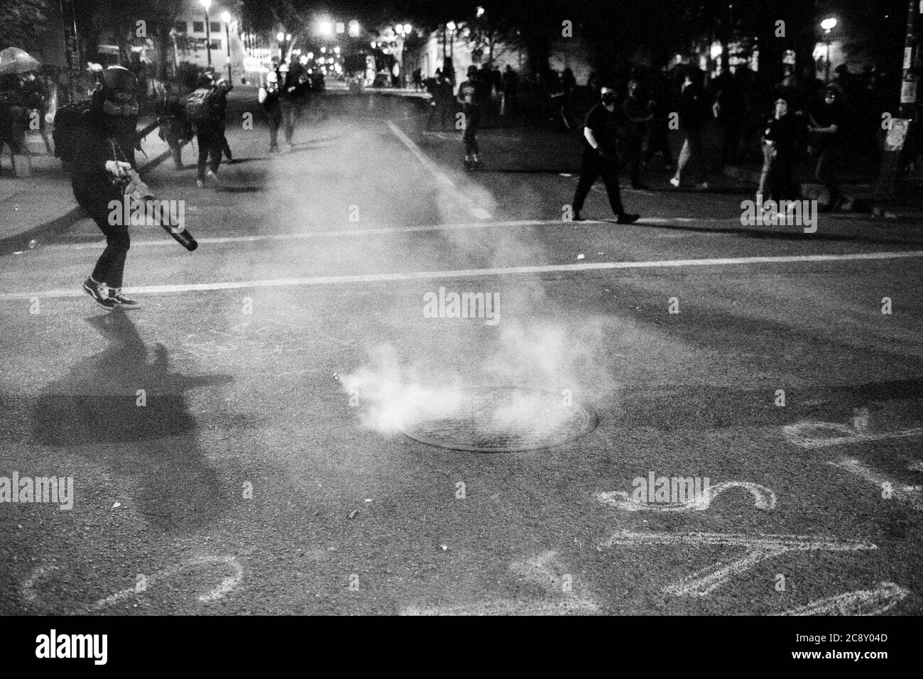 PORTLAND, OR - JULY 26: Protestors clash with Federal Protections Officers outside the Mark O. Hatfield United States Courthouse on July 26, 2020 in Portland, Oregon. Photo: Chris Tuite/imageSPACE/MediaPunch Stock Photo