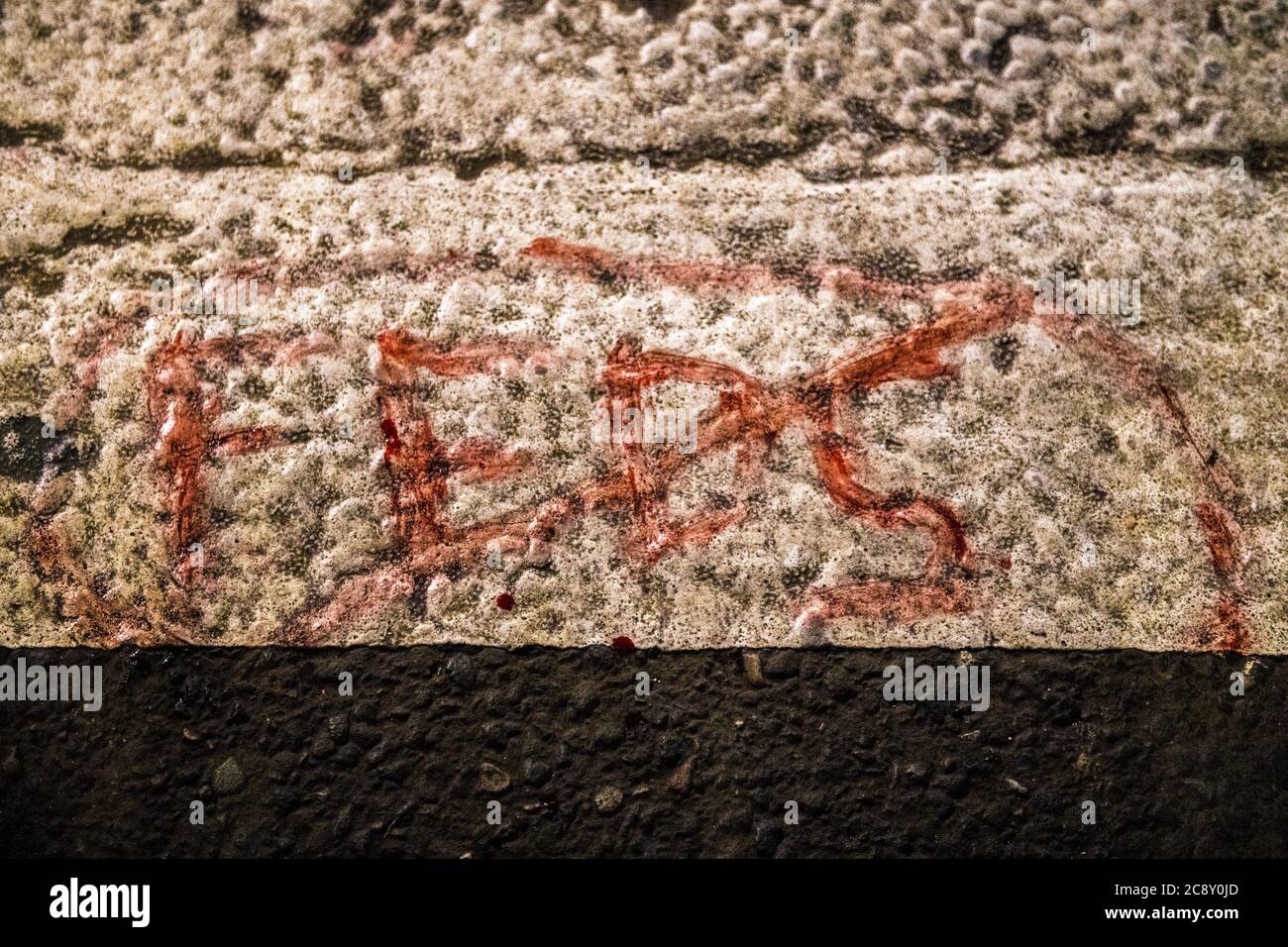 Portland, OR, USA. 26th July, 2020. Feds crossed out is written in blood by a protester who was hit directly in the face with a projectile by Federal Agents outside the Mark O. Hatfield United States Courthouse in Portland, Oregon on July 26, 2020 after the death of George Floyd. ( Credit: Chris Tuite/Image Space/Media Punch)/Alamy Live News Stock Photo