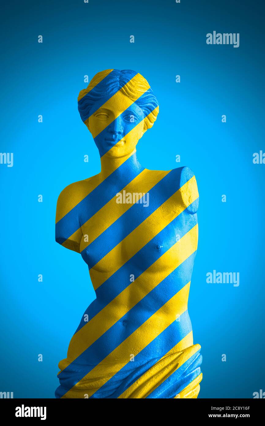 Aphrodite Goddess Of Love In Blue And Yellow Stripes In Cobalt Background Stock Photo Alamy