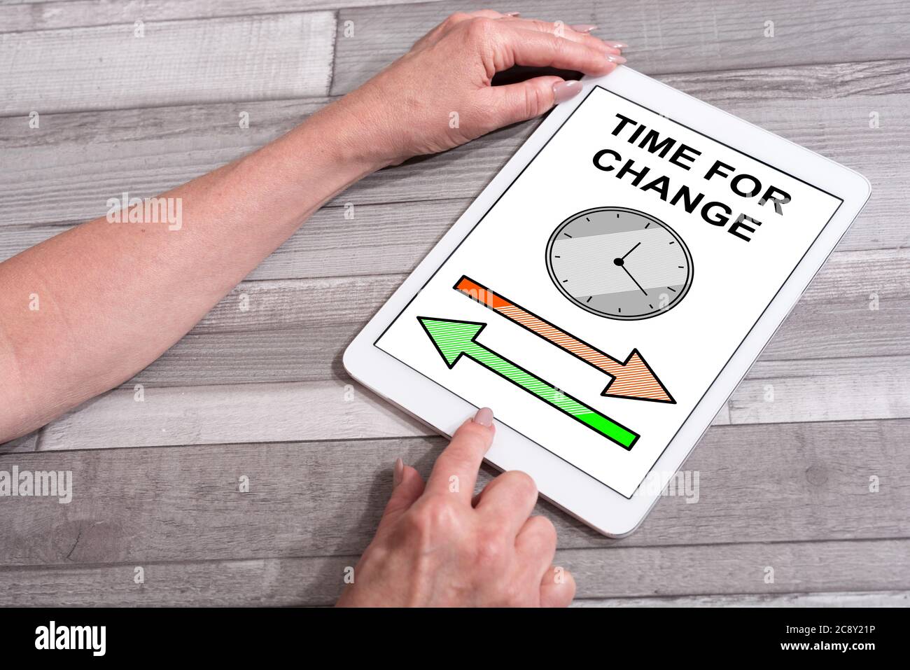 Time for change concept shown on a tablet used by a woman Stock Photo