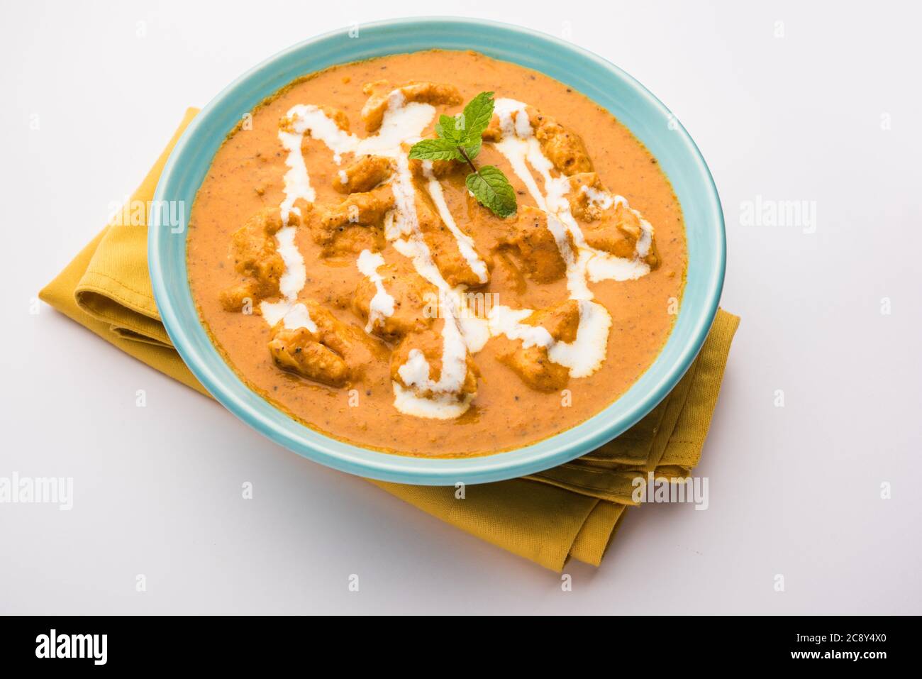 Tasty butter chicken curry or Murg Makhanwala or masala dish from Indian cuisine Stock Photo