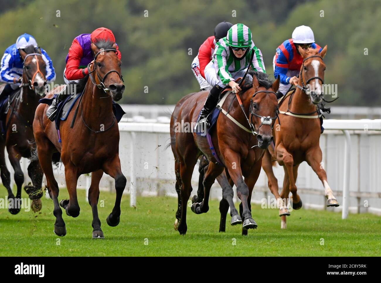 Saffie Osborne on board Hot Scoop wins the British EBF Novice Stakes at Royal Windsor Racecourse. Stock Photo