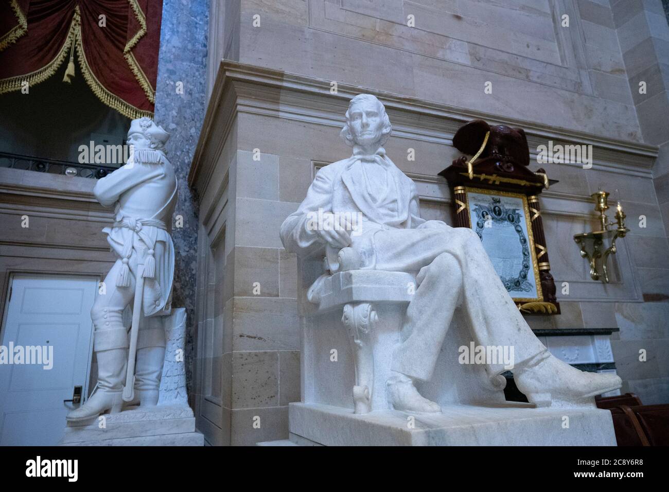 A statue of Alexander Hamilton Stephens, right, is displayed at the U.S