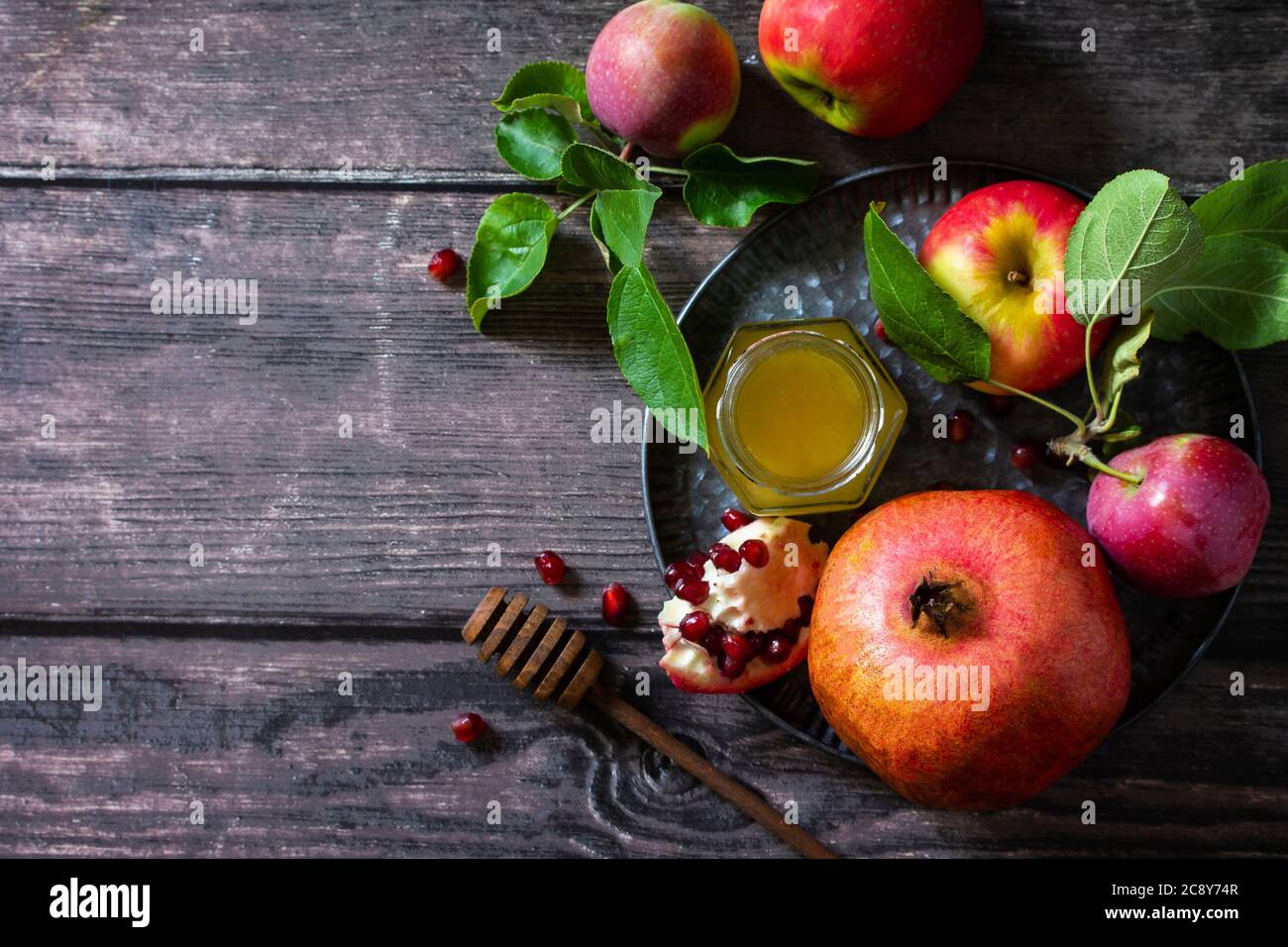 Jewish new year holiday concept. Traditional symbols honey, fresh
