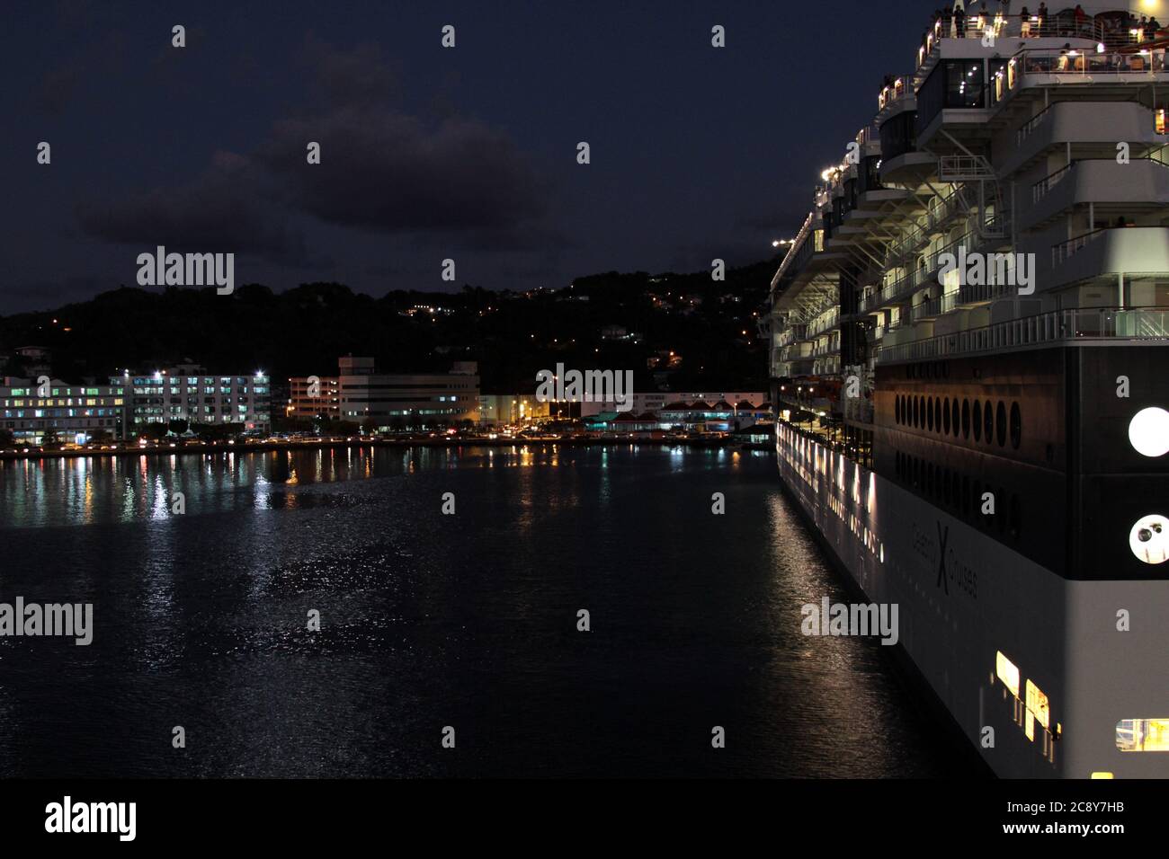 cruise ship docked in port at night Stock Photo - Alamy