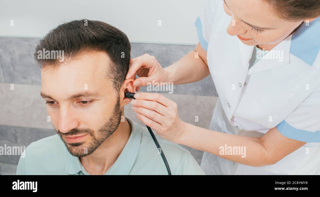 Diagnosis of hearing impairment, tympanometry, hearing test. A man