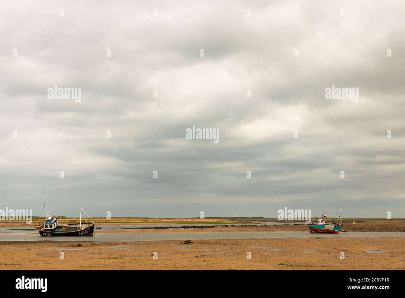 The beach at Brancaster,  Norfolk, UK when the tide is out Stock Photo