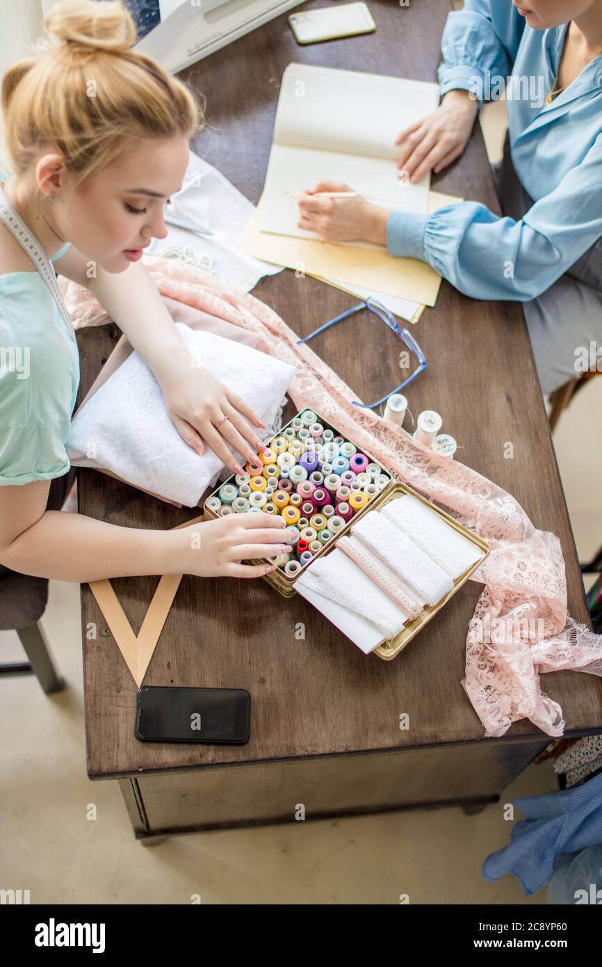 Couple of young beautiful business women starting their own small
