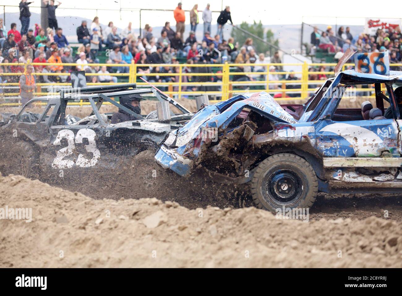 Idaho Falls, Idaho, USA August 17, 2016 Dust flies as cars and drivers in a small arena compete in a small town demolition derby. Stock Photo