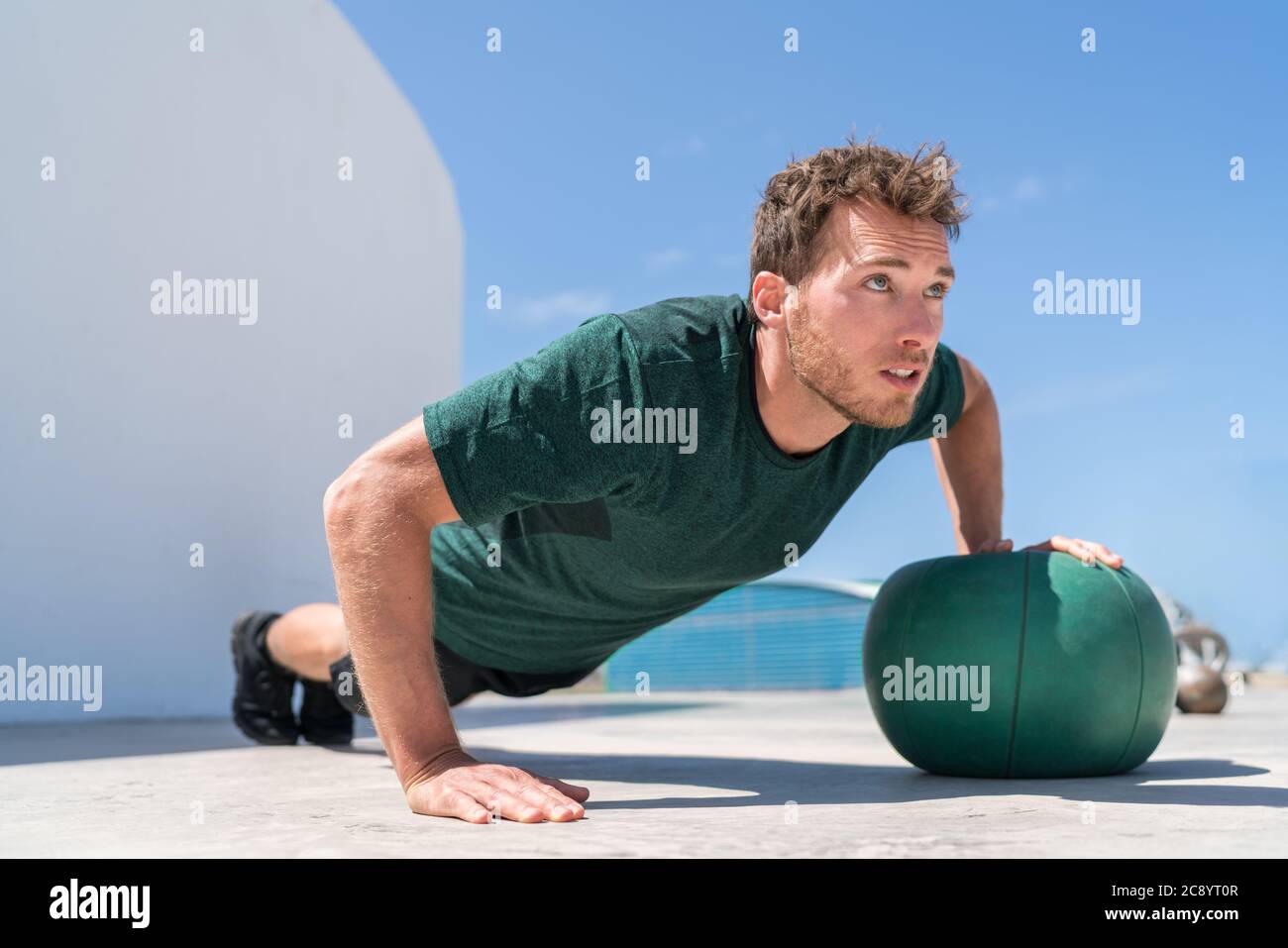 Pushup athlete strength training on medicine ball Stock Photo Alamy