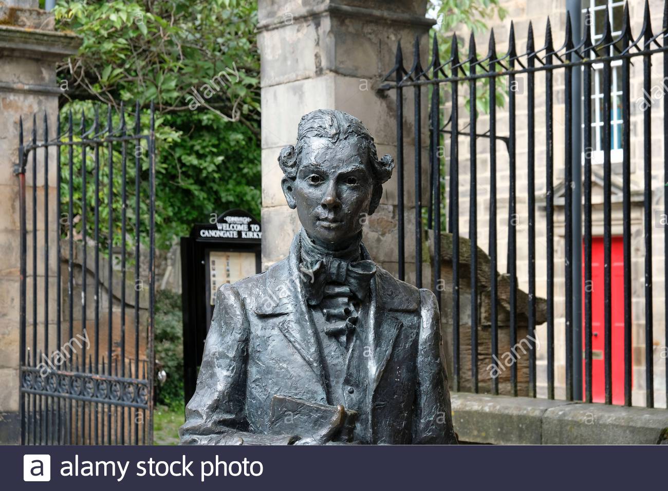 Sculpture of Scottish poet  Robert Fergusson outside the Canongate Kirk, Royal Mile, Edinburgh Scotland Stock Photo