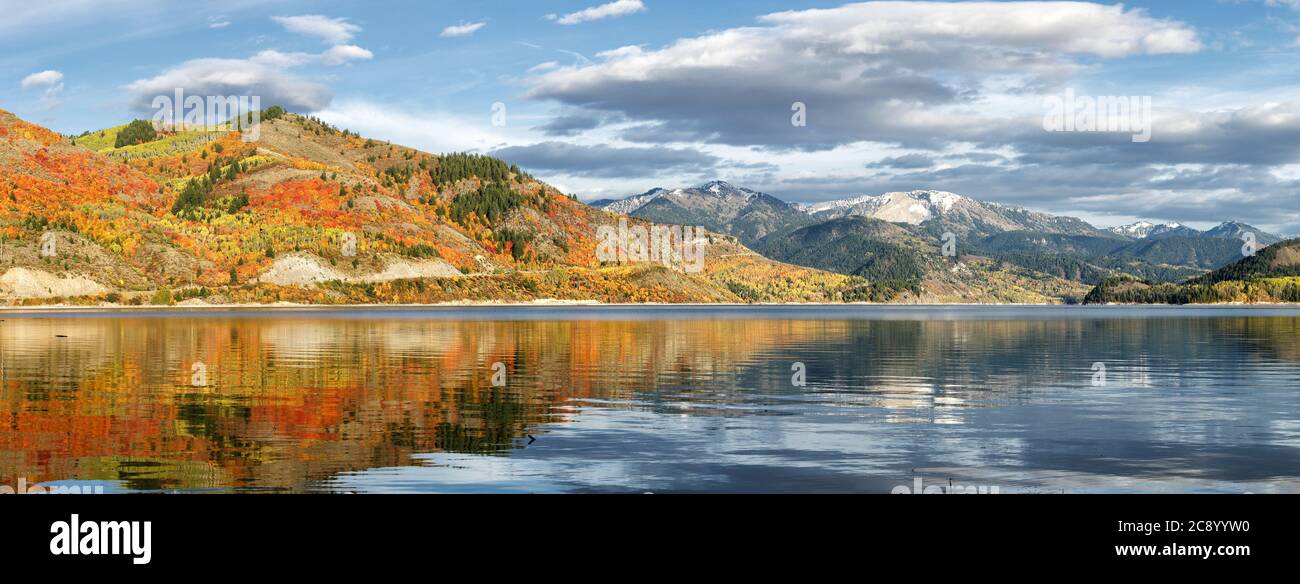 Fall colors of red yellow, and orange on the trees in the mountains near Pallisades reservoir in Idaho. Stock Photo