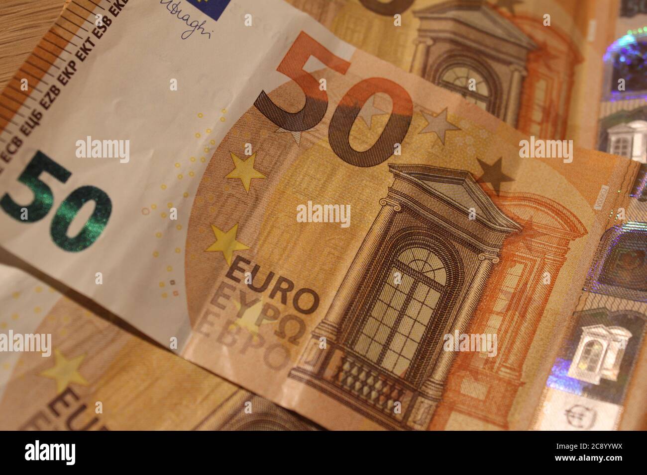 Euro's bills and coins. /Ana Bornay Stock Photo