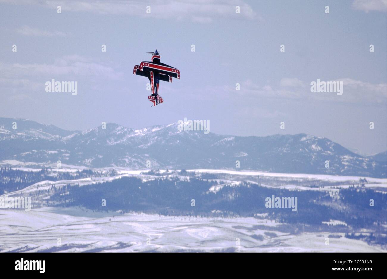 Soda Springs, Idaho, USA April 16, 1999 Air to air image of a stunt pilot practicing aerial acrobatics for an air show. Stock Photo