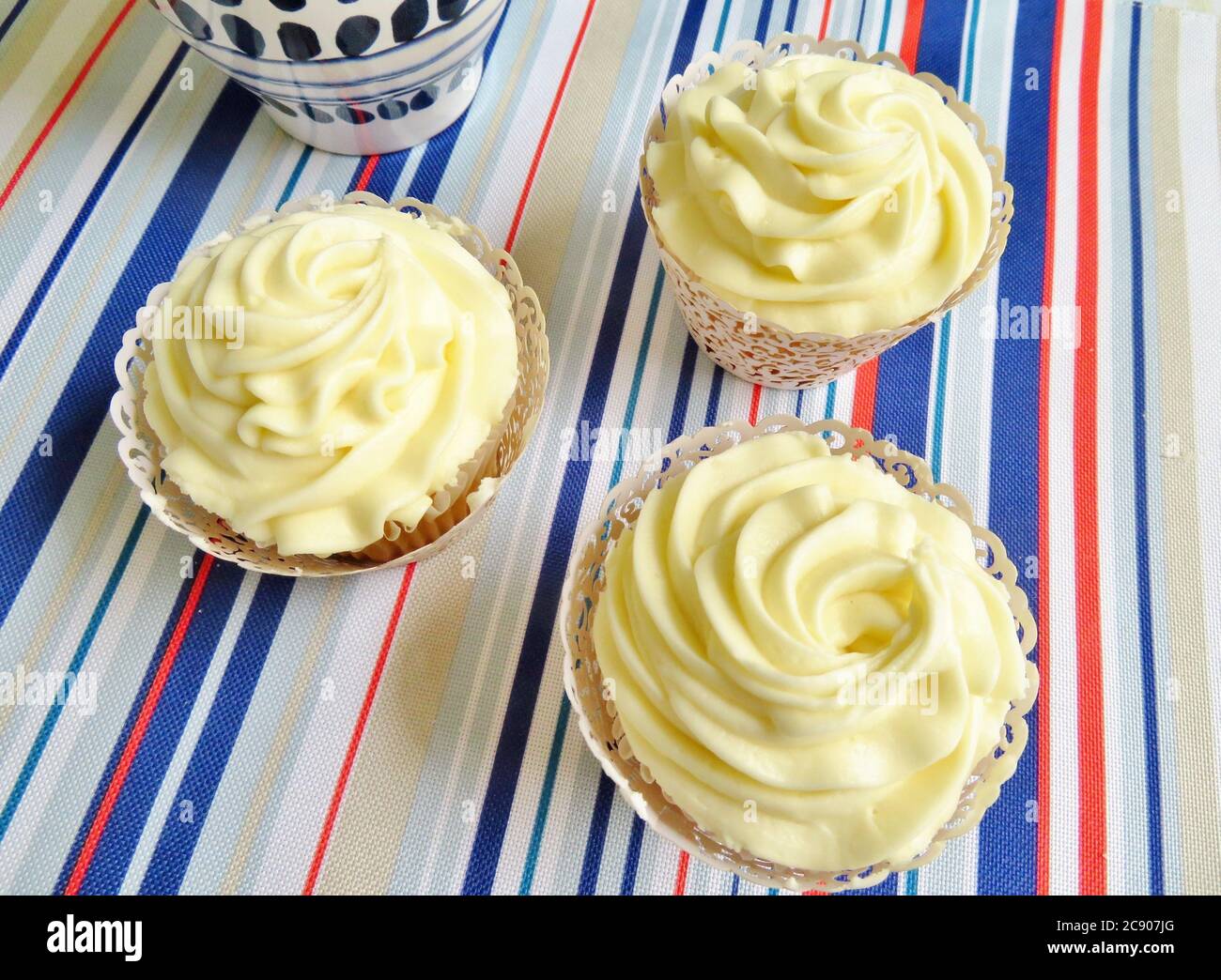 Cupcakes decorated with a vanilla frosting for birthdays, weddings, or showers Stock Photo