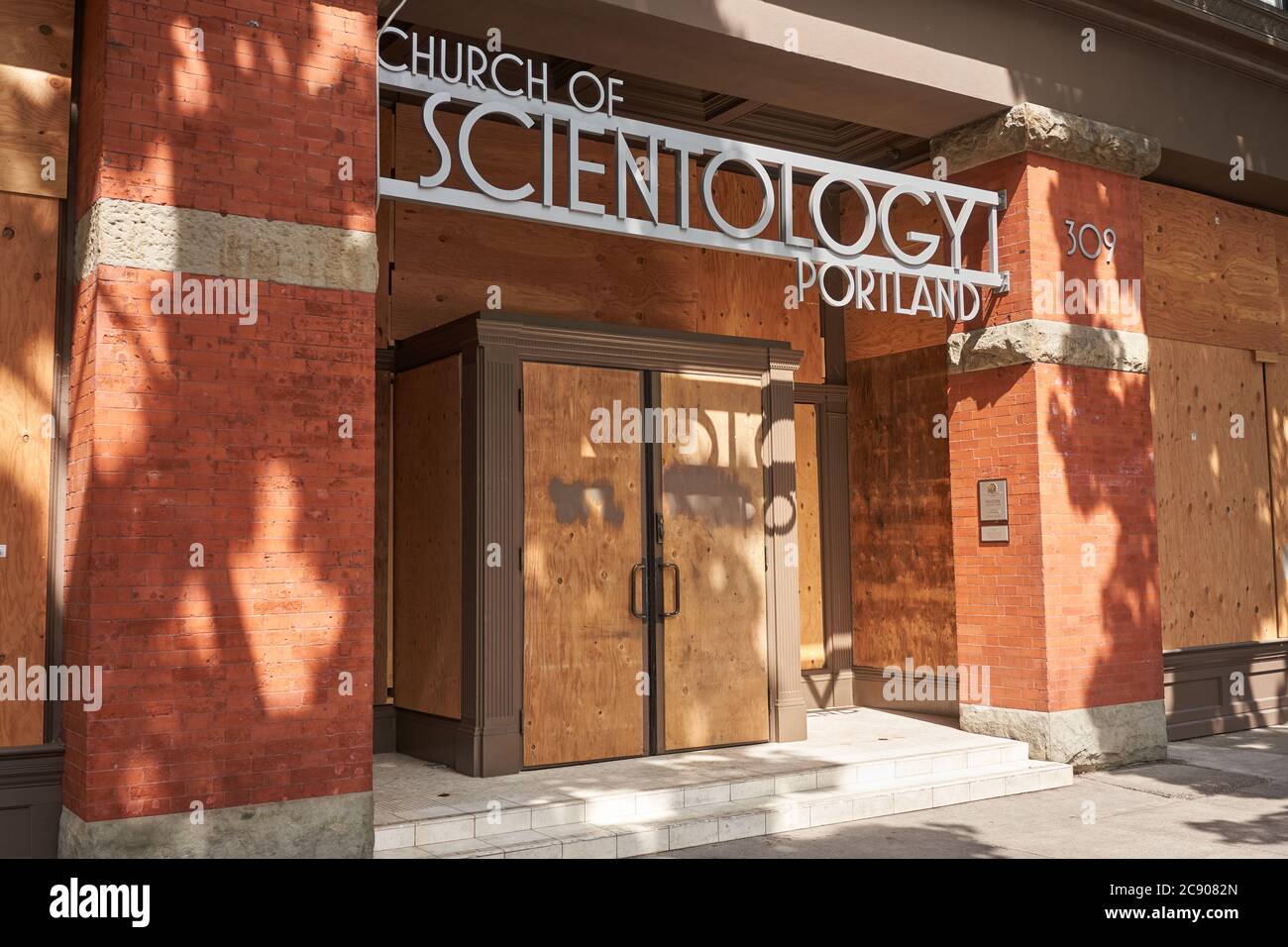 The boarded up Church of Scientology in downtown Portland, Oregon, amid the ongoing BLM protest, seen on Saturday, July 11, 2020. Stock Photo