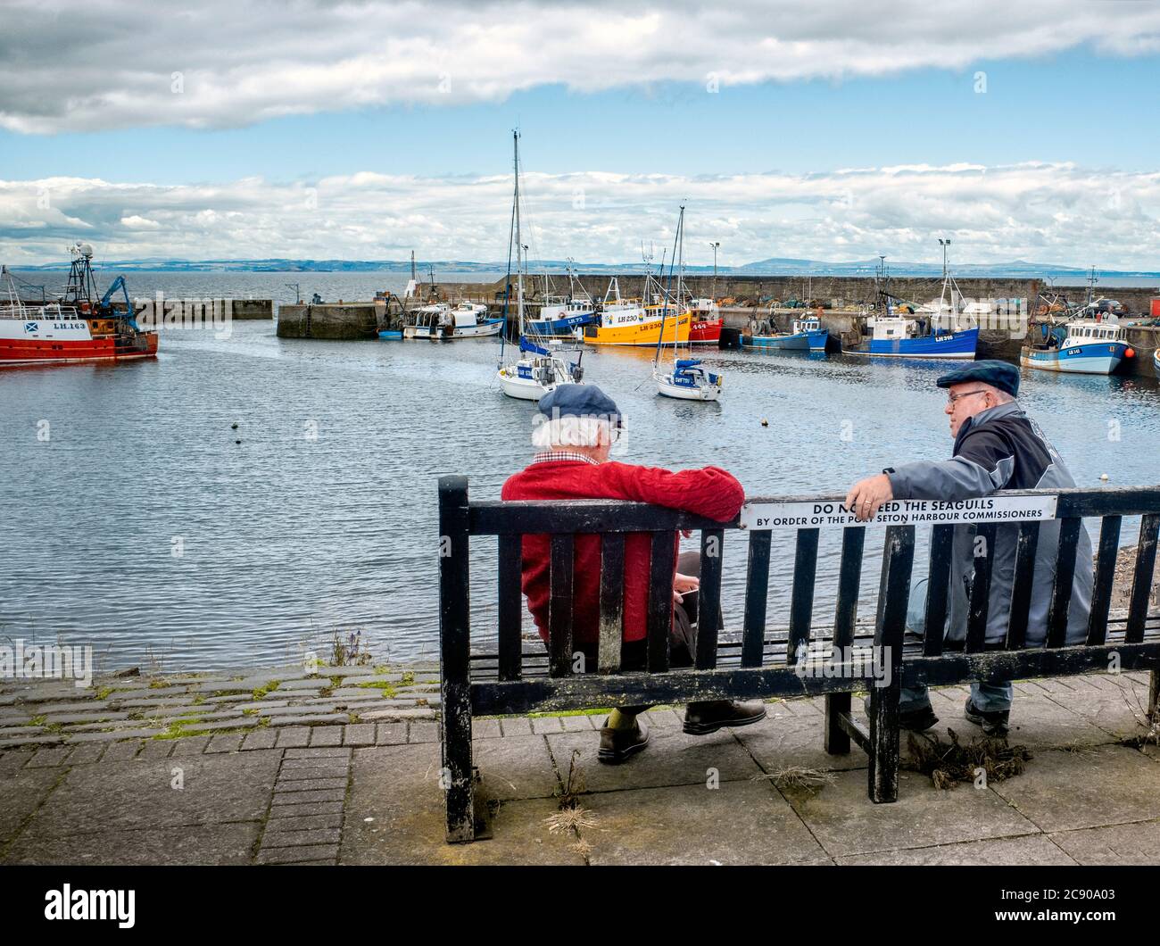 Two old men sitting on bench hi-res stock photography and images - Alamy