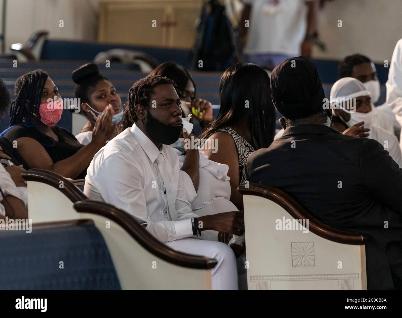 New York, NY - July 27, 2020: Father Davell Gardner Sr and mother Felicia Gordon seen at the funeral for 1-year-old boy killed by bullet at Pleasant Grove Baptist Church Stock Photo