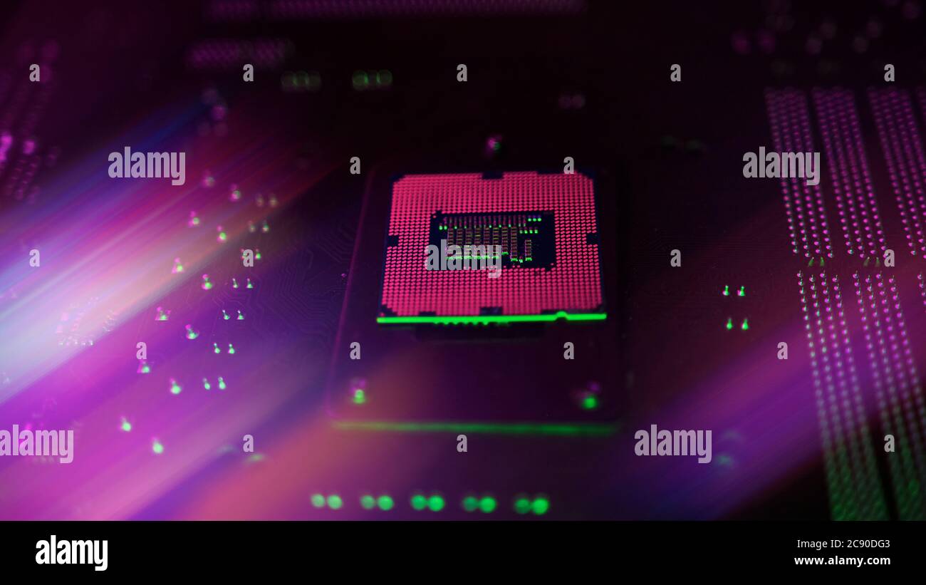 RGB pink lights inside CPU processor, computer concept Stock Photo