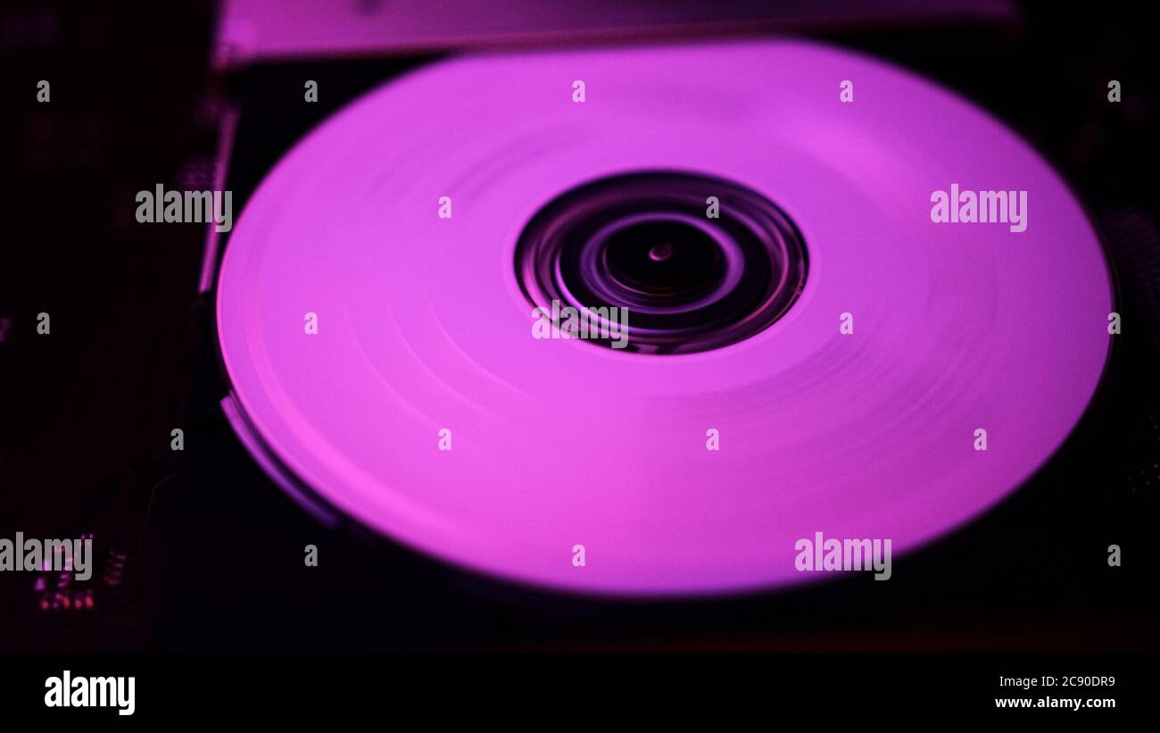 CD rom with pink lights and a cd that inside turns Stock Photo