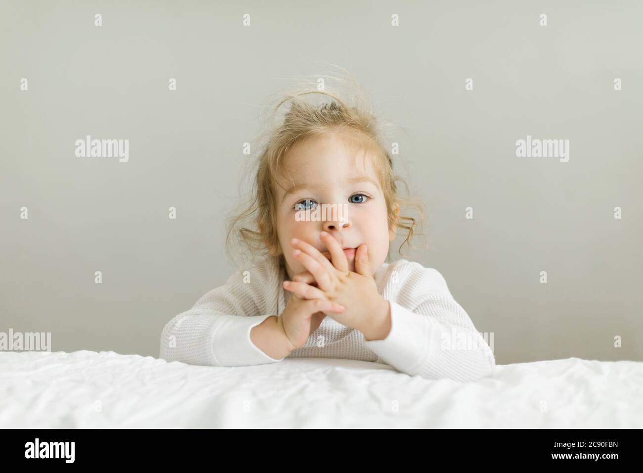 Leaning on bed hires stock photography and images Alamy