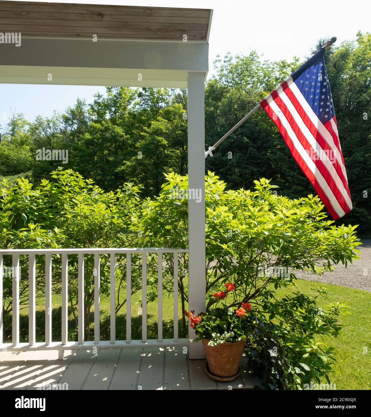 USA, US flag on porch Stock Photo