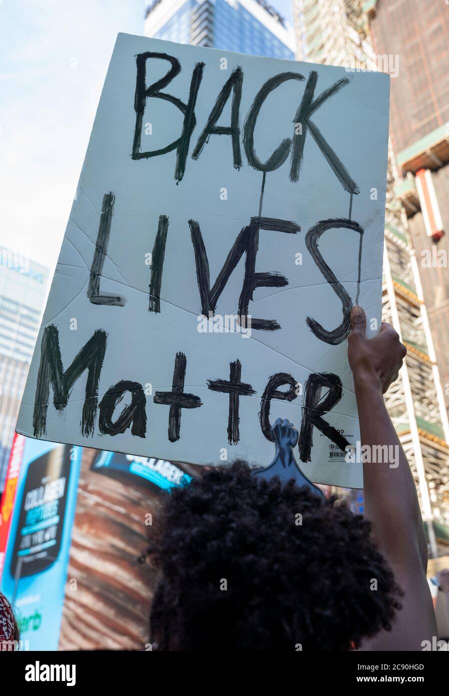 Black Womans/Womxn March Black Lives Matter Protest- New York City, Times Square - Black Lives Matter sign held up Black power Stock Photo