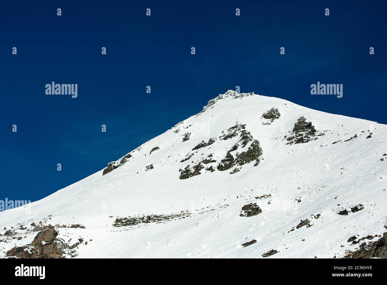 Winter landscape of snow mountain against blue sky in South island, New Zealand. Stock Photo
