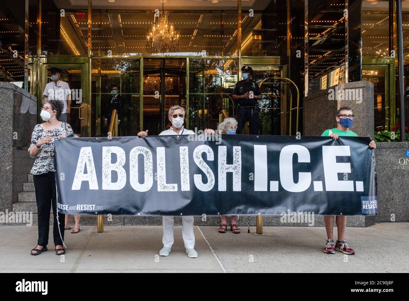 Rise and Resist activists attend a vigil in support of Black Lives Matter and protesting Trump's policies outside Trump International Hotel and Tower in New York City on July 27, 2020. (Photo by Gabriele Holtermann/Sipa USA) Credit: Sipa USA/Alamy Live News Stock Photo