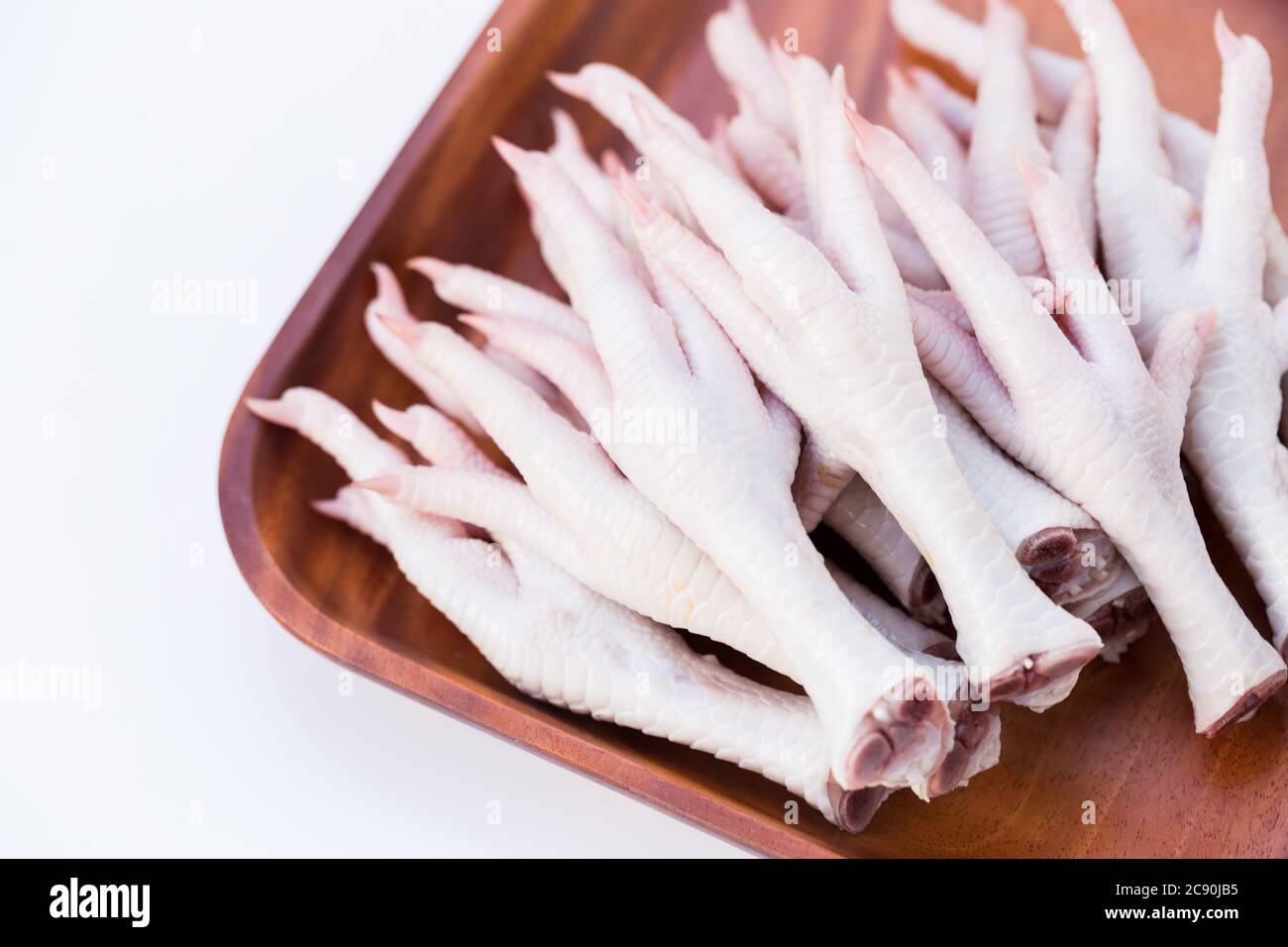 Fresh chicken feet Stock Photo Alamy
