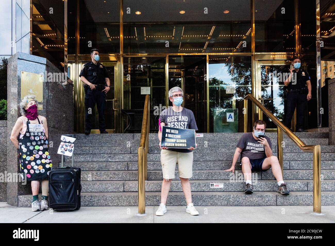 Rise and Resist activists attend a vigil in support of Black Lives Matter and protesting Trump's policies outside Trump International Hotel and Tower in New York City on July 27, 2020. (Photo by Gabriele Holtermann/Sipa USA) Credit: Sipa USA/Alamy Live News Stock Photo