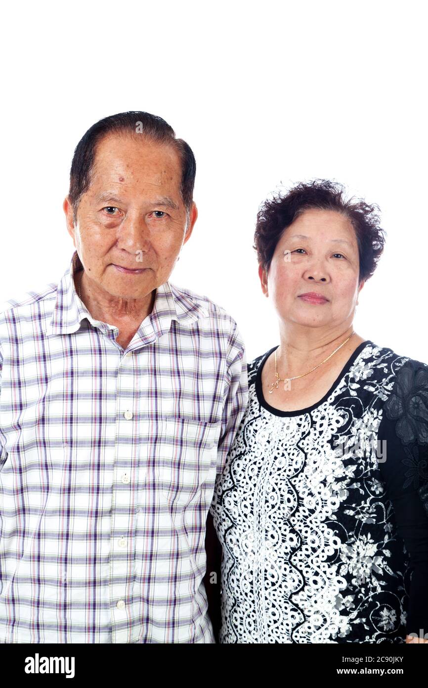 Married senior Asian couple portrait, isolated on white. Stock Photo