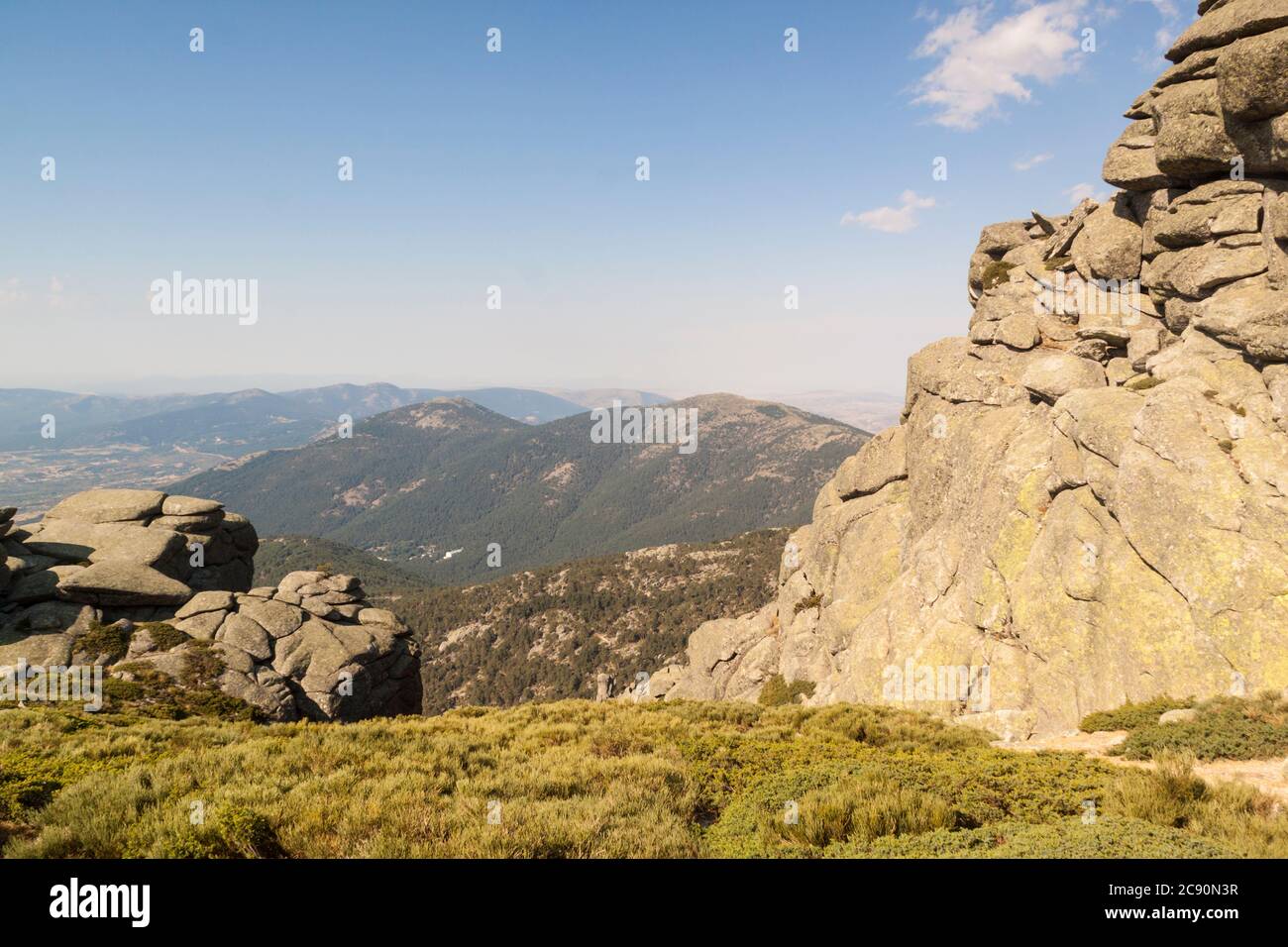 Siete Picos mountains and forests in the Sierra de Guadarrama National Park. Madrid and Segovia. Eroded rocks and stones on top. Stock Photo