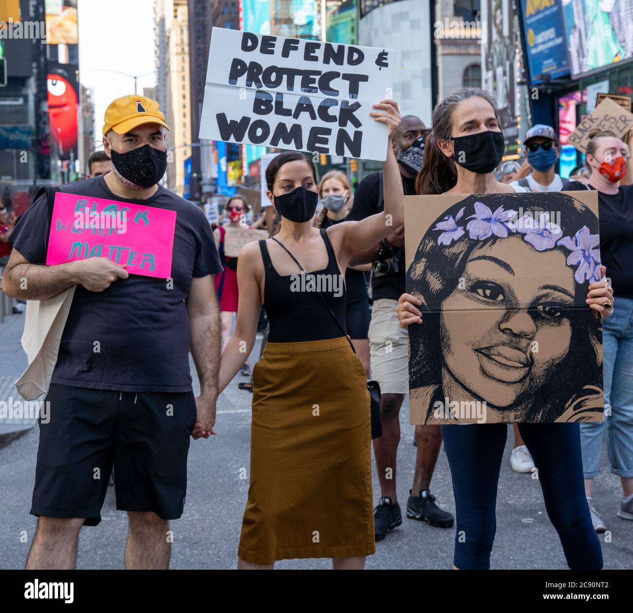 Black Womens/Womxn March Black Lives Matter Protest - New York City Defend and Protect Black Women, Breonna Taylor Drawn protest sign Stock Photo