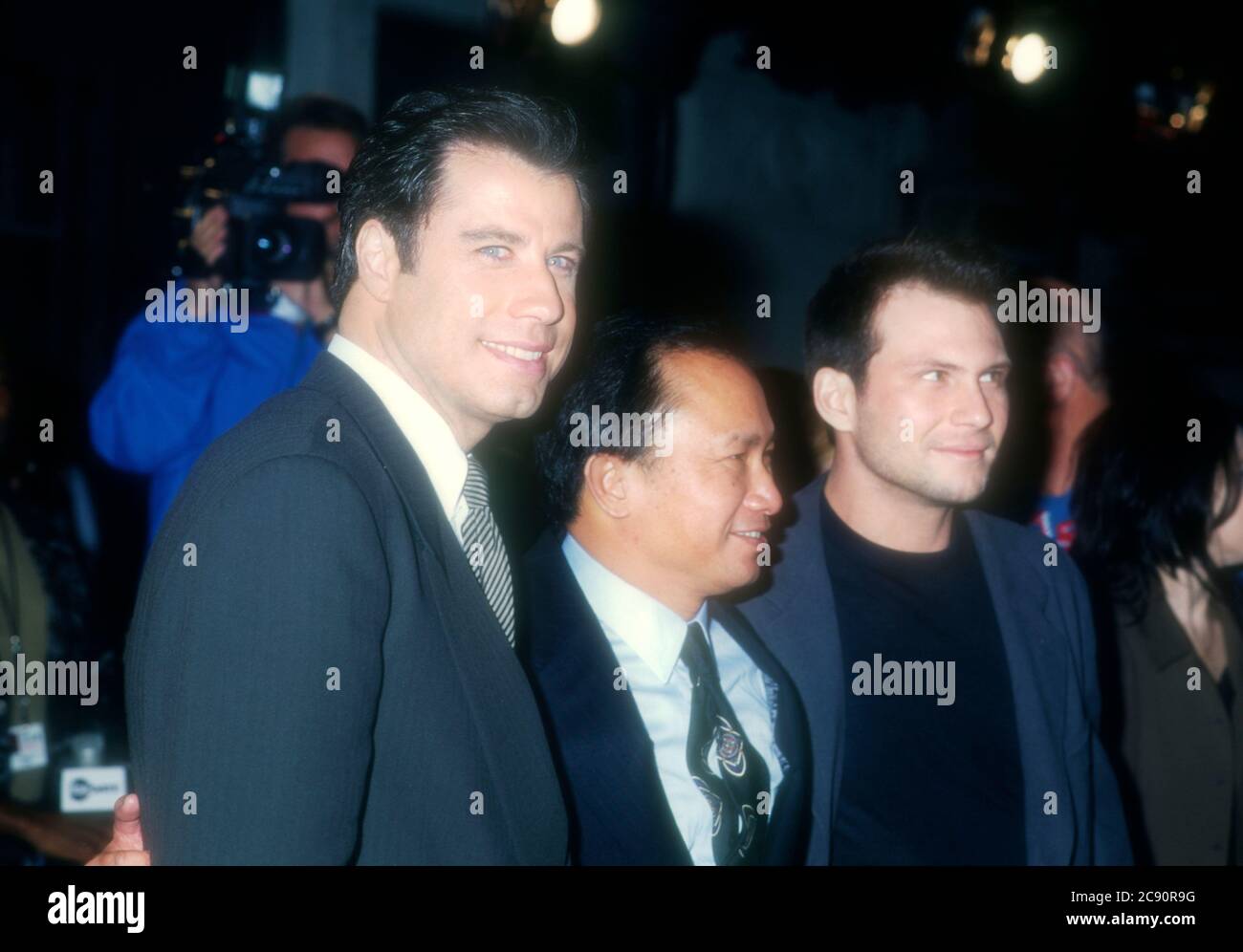 Westwood, California, USA 5th February 1996 Actor John Travolta, director John Woo and actor Christian Slater attend 20th Century Fox' 'Broken Arrow' Premiere on February 5, 1996 at Mann Village Theatre in Westwood, California, USA. Photo by Barry King/Alamy Stock Photo Stock Photo