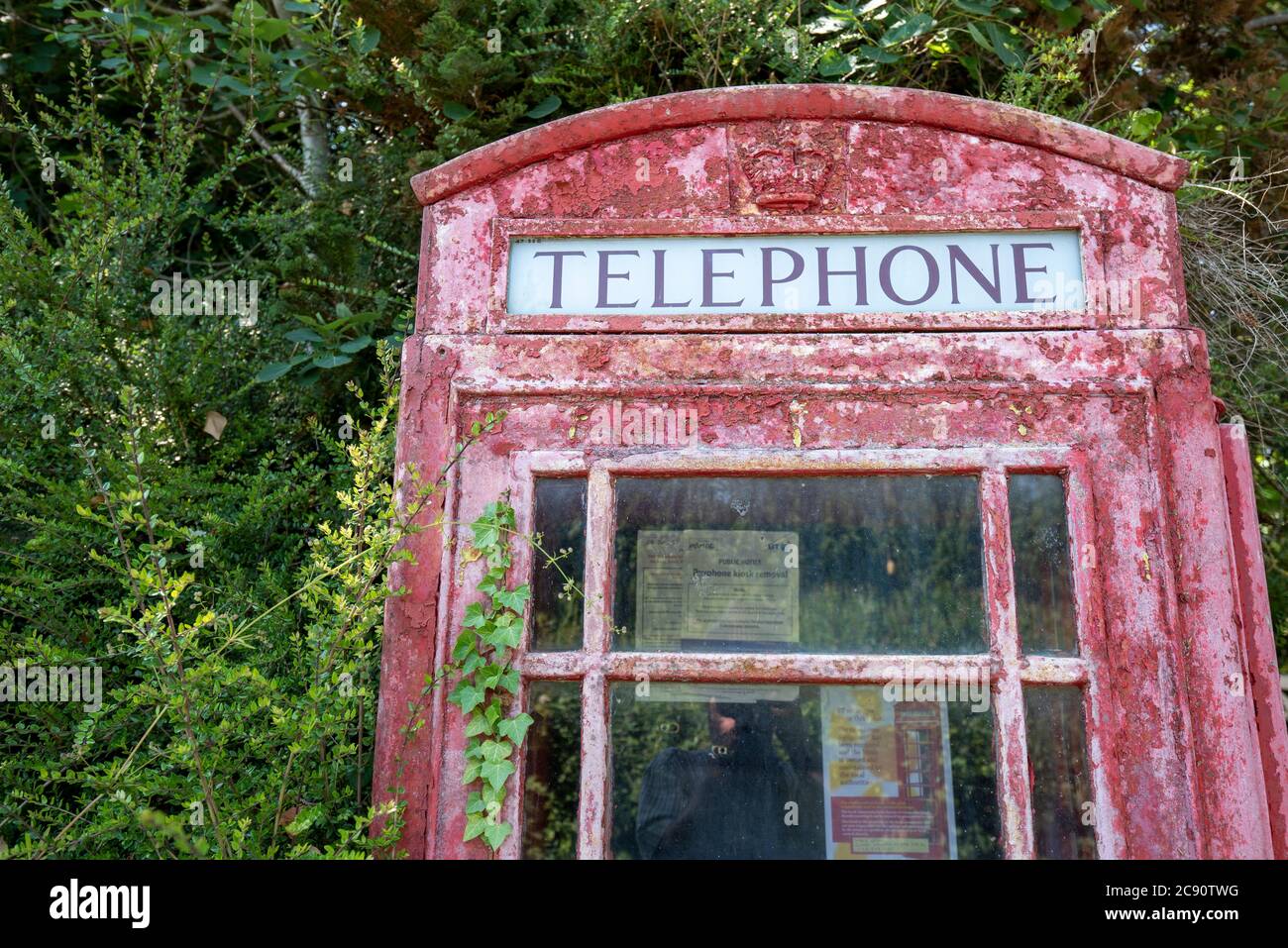 A redundant payphone in rural England Stock Photo