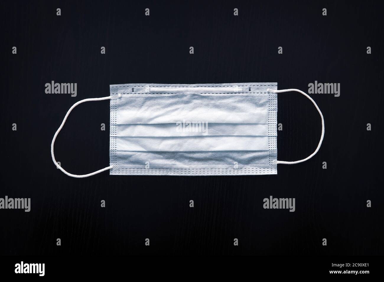 Black disposable face mask hi-res stock photography and images - Alamy