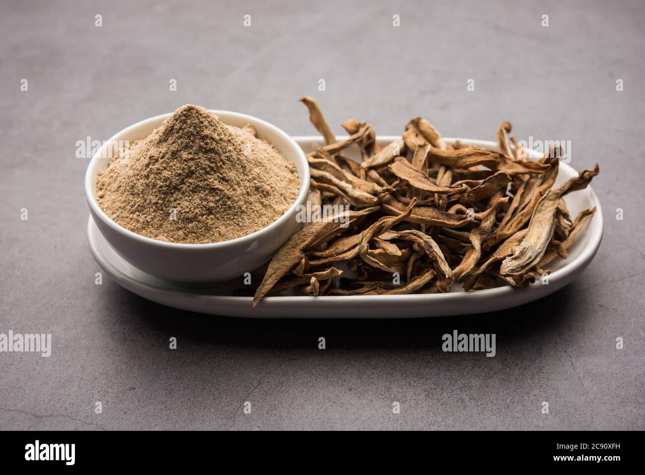 dry mango powder also known as Amchoor or Amchur, it's an Indian Spice with dried fruit Stock Photo