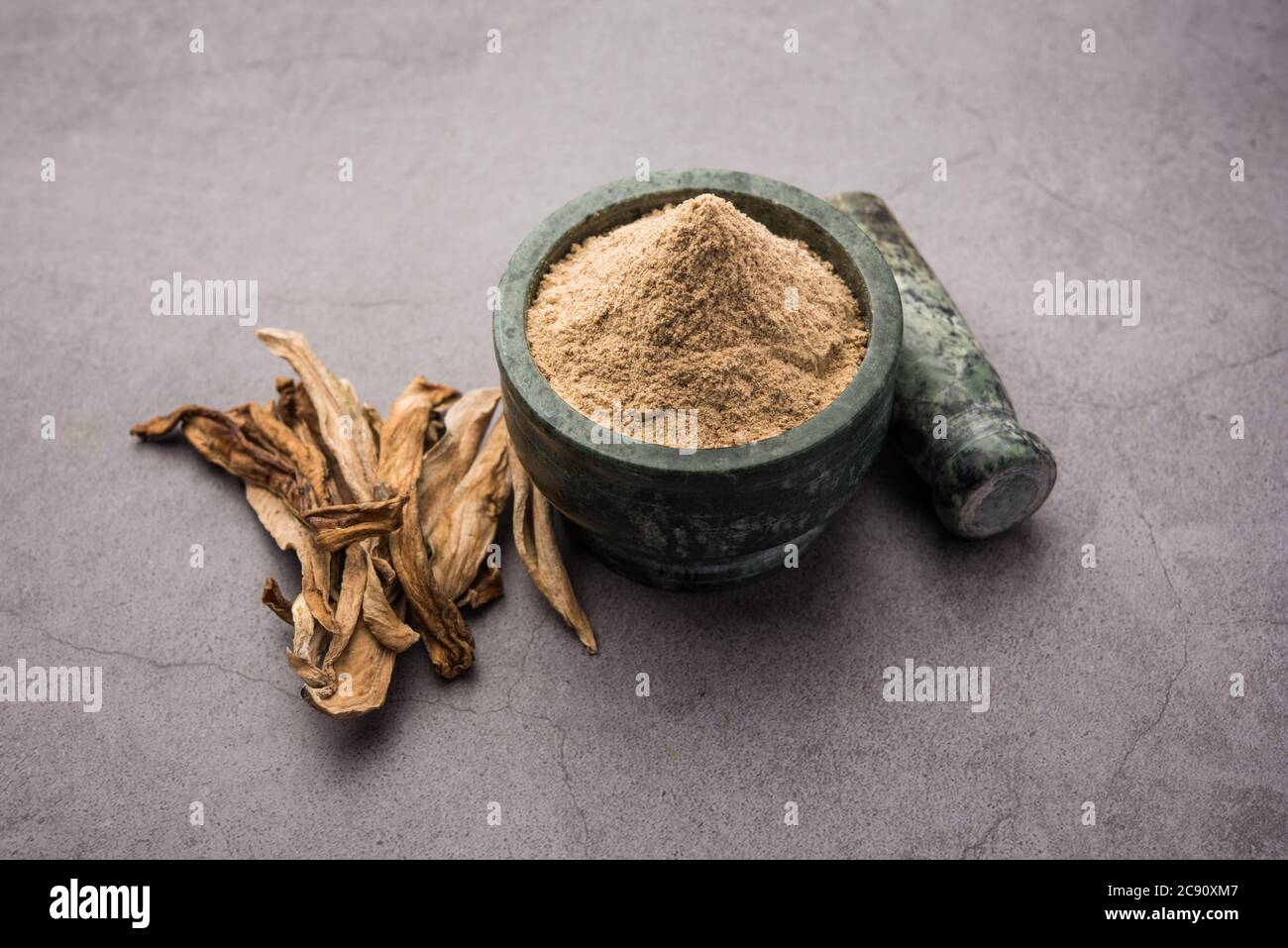 dry mango powder also known as Amchoor or Amchur, it's an Indian Spice with dried fruit Stock Photo