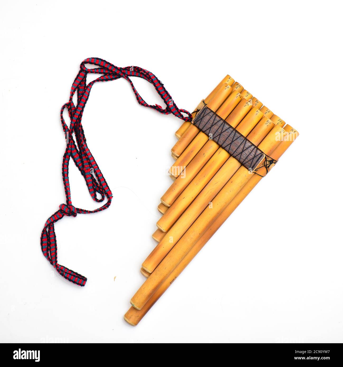 Pan flute andean wind instrument on a white background Stock Photo - Alamy
