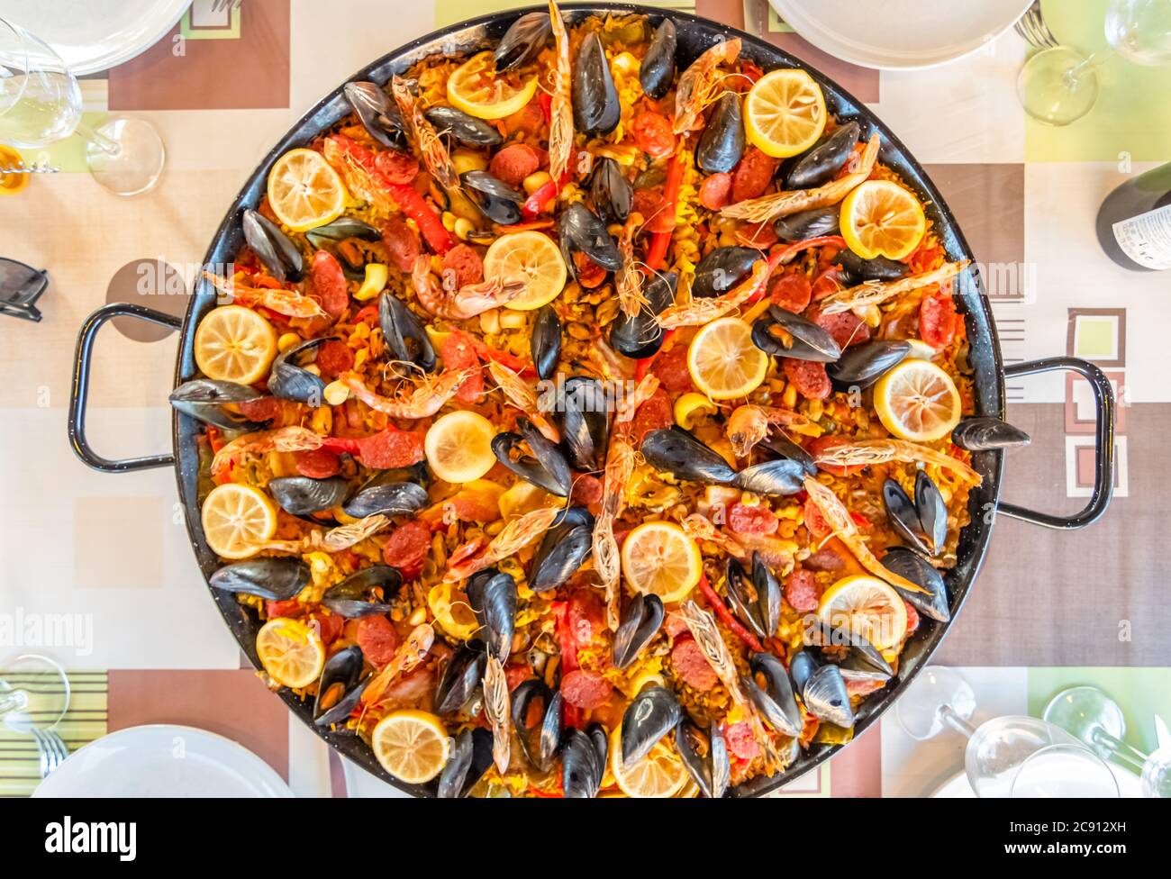 Paella dish with seafood, mussels, prawns, chicken, chorizo, rice