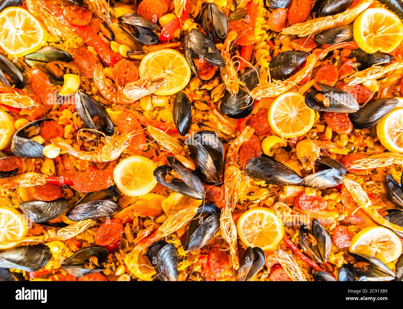 Paella dish with seafood, mussels, prawns, chicken, chorizo, rice