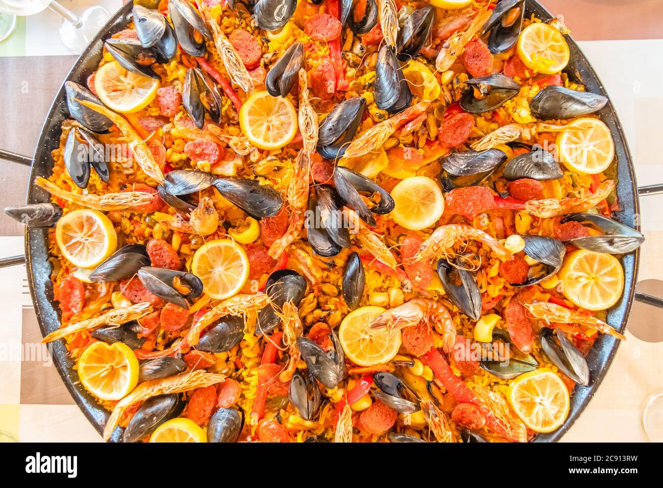 Paella dish with seafood, mussels, prawns, chicken, chorizo, rice