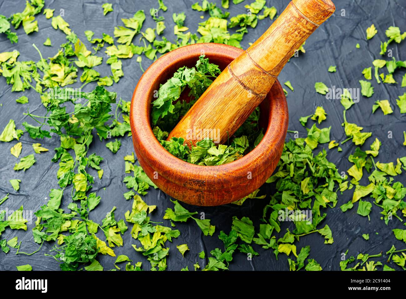 Condiment or spice made from dried green parsley Stock Photo - Alamy