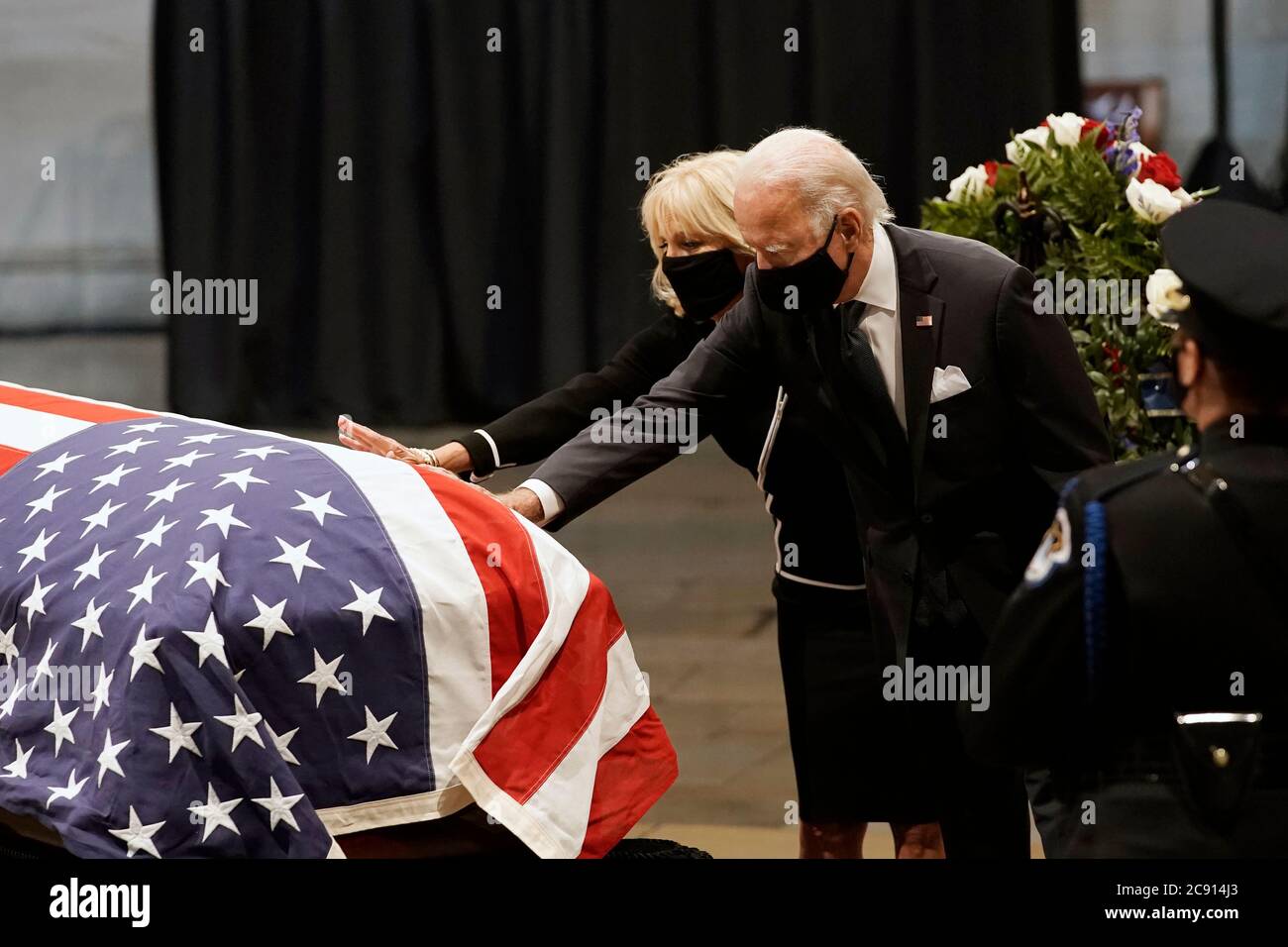 (200728) -- WASHINGTON, D.C., July 28, 2020 (Xinhua) -- Former U.S. Vice President Joe Biden, the presumptive Democratic presidential nominee, and his wife Jill Biden pay their respects to late U.S. congressman and civil rights figure John Lewis at the Capitol Rotunda in Washington, DC, the United States, on July 27, 2020. Late U.S. congressman and civil rights figure John Lewis lay in state in the Capitol here on Monday. (J. Scott Applewhite/Pool via Xinhua) Stock Photo