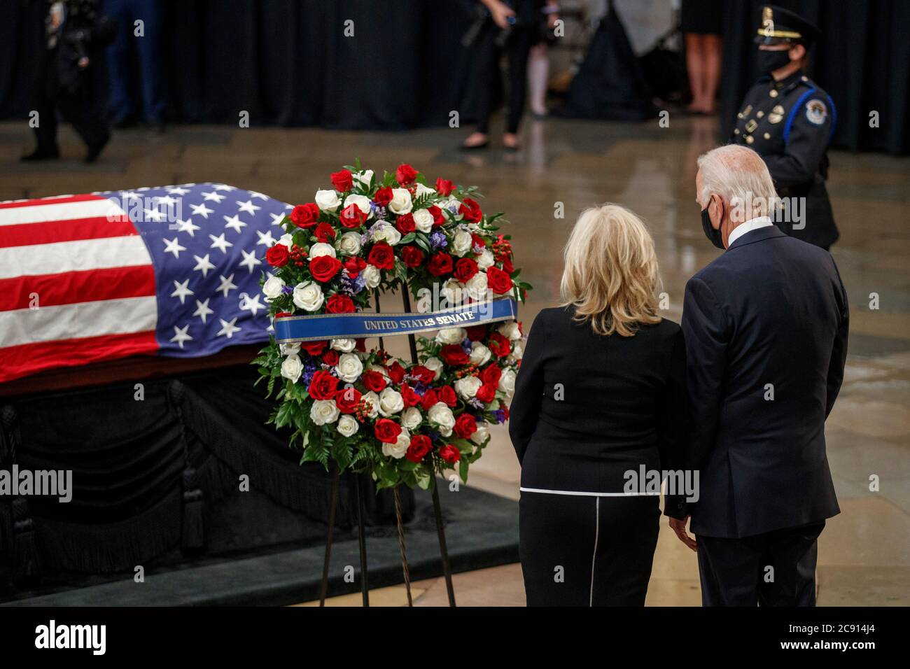 (200728) -- WASHINGTON, D.C., July 28, 2020 (Xinhua) -- Former U.S. Vice President Joe Biden, the presumptive Democratic presidential nominee, and his wife Jill Biden pay their respects to late U.S. congressman and civil rights figure John Lewis at the Capitol Rotunda in Washington, DC, the United States, on July 27, 2020. Late U.S. congressman and civil rights figure John Lewis lay in state in the Capitol here on Monday. (Shawn Thew/Pool via Xinhua) Stock Photo