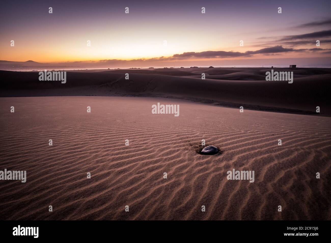 Spectacular Sunrise Sandy dunes in famous natural Maspalomas beach. Gran Canaria. Spain Stock Photo