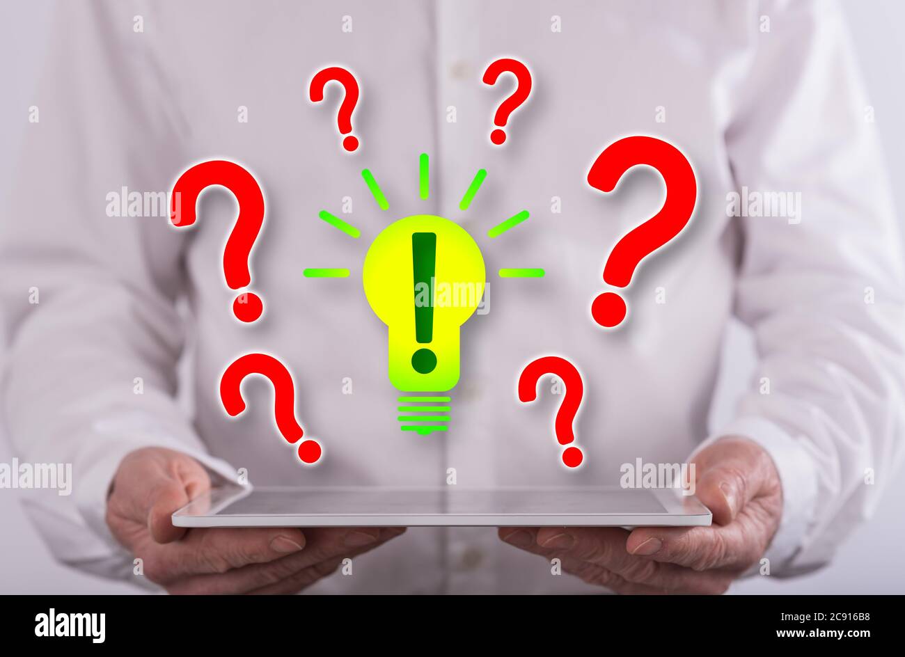 Problem solving concept above a tablet held by a man in background Stock Photo